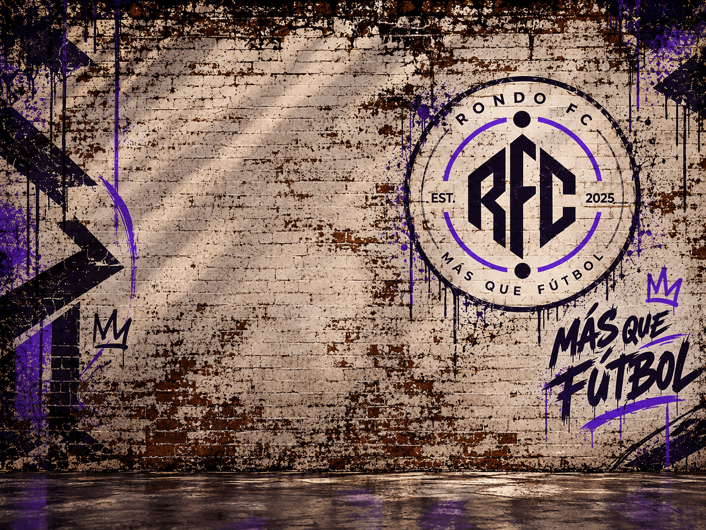 Rondo FC crest and MÁS QUE FÚTBOL graffiti on a brick wall